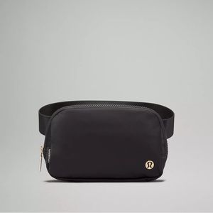 Brand new with tags! Lululemon “Everywhere Belt Bag 1L” black and gold hardware